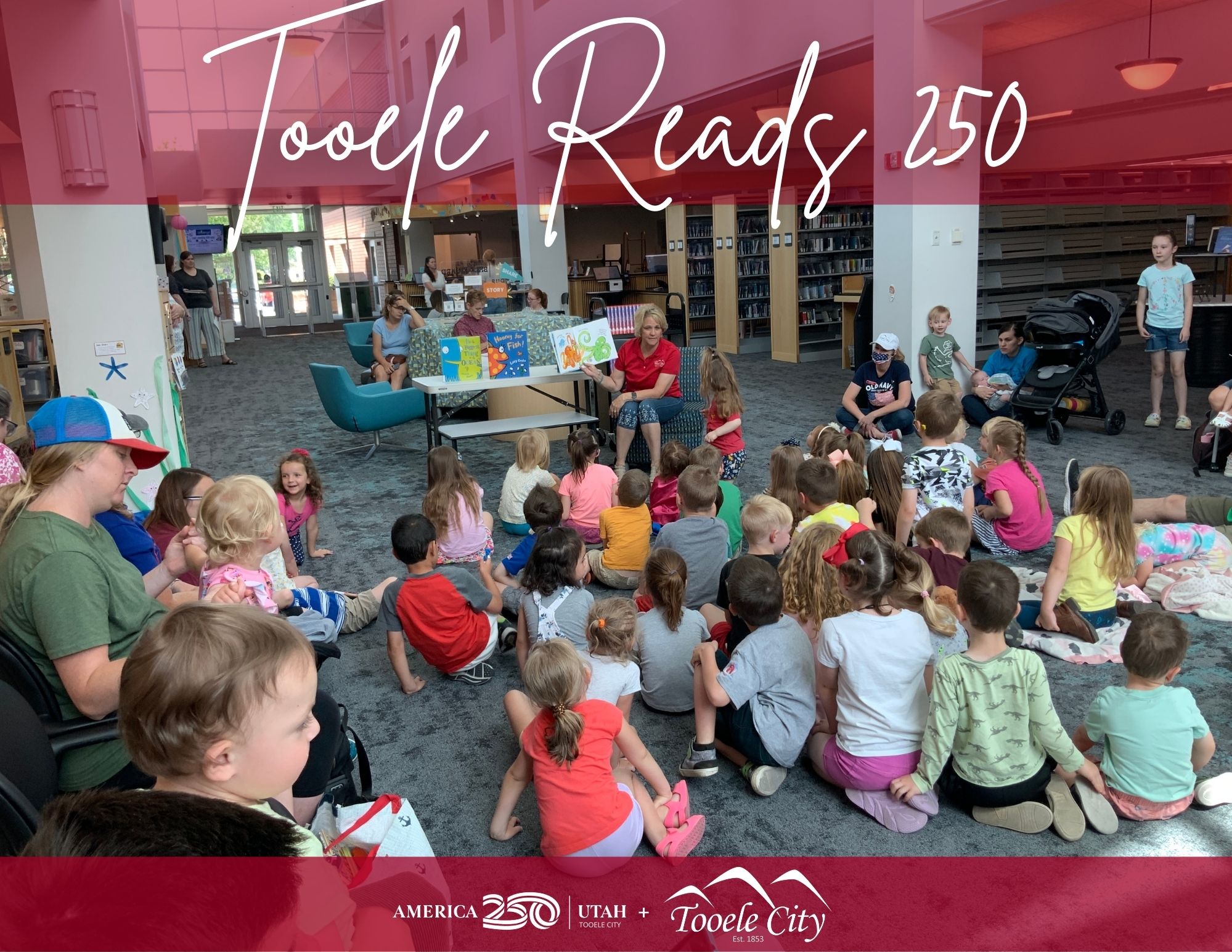 Mayor Winn reading to children at the Tooele City Library.